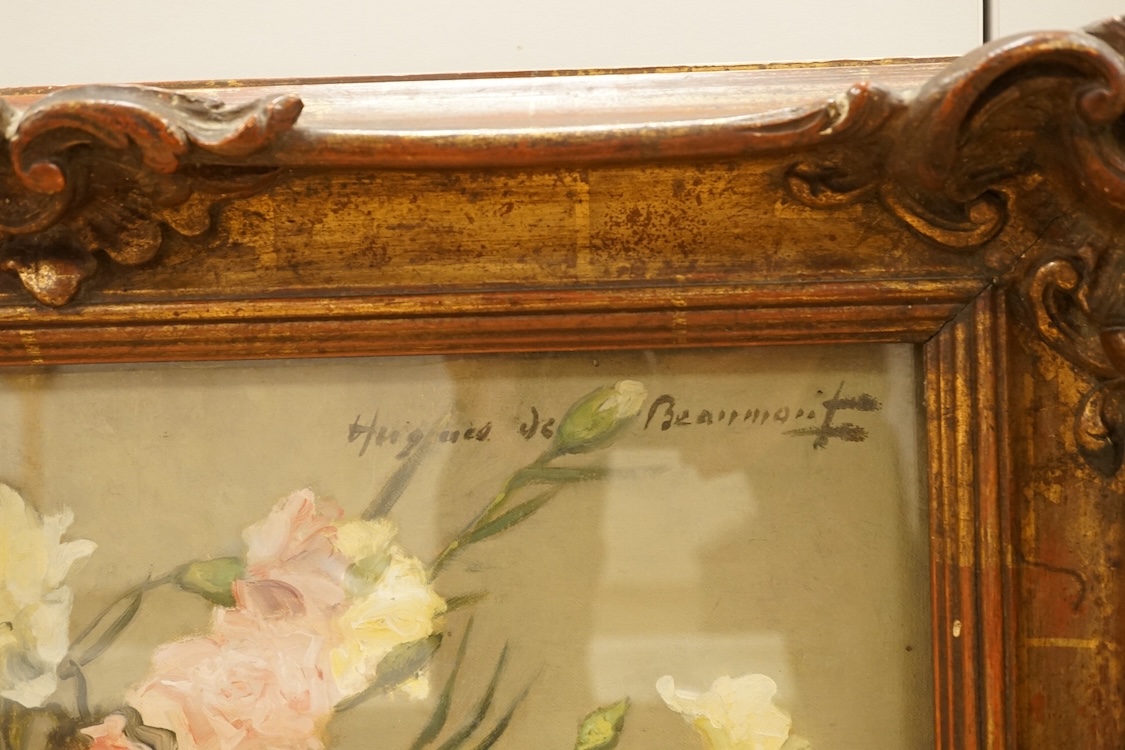 Hugues De Beaumont (French, 1874-1947), Still life of flowers and a book, signed, oil on canvas, 37 x 45cm, ornate frame